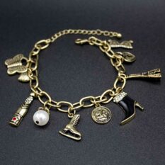 Darice gold-plated charm bracelet.